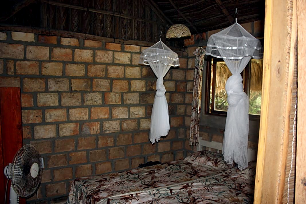 Double bedroom with mosquito nets at Terra Bella